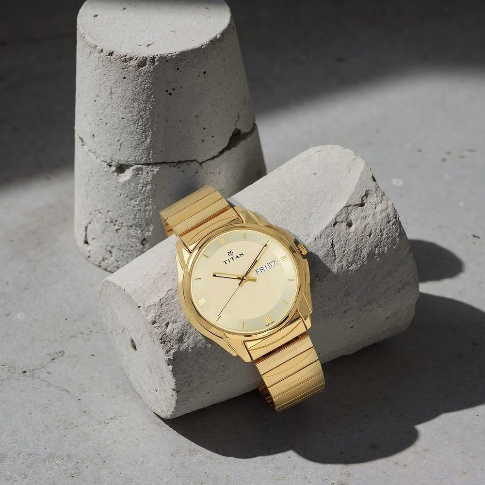 Titan Quartz Analog with Day and Date Champagne Dial Golden Stainless Steel Strap Watch For Men - NU1578YM05
